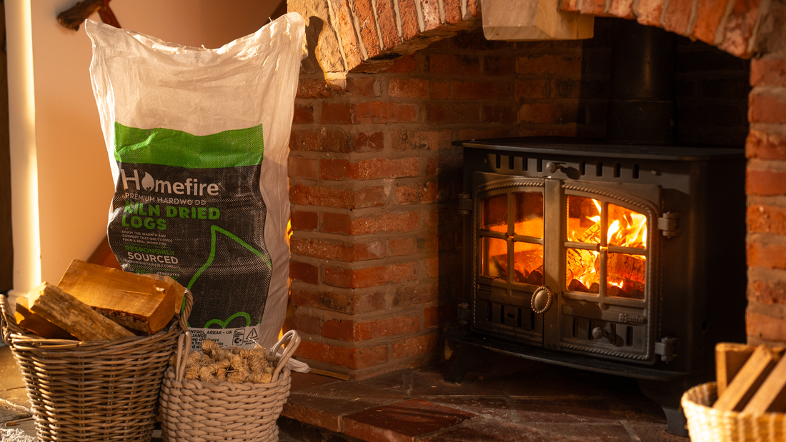 Homefire firewood in front of a clean and maintained fireplace, set into a hearth with chimney